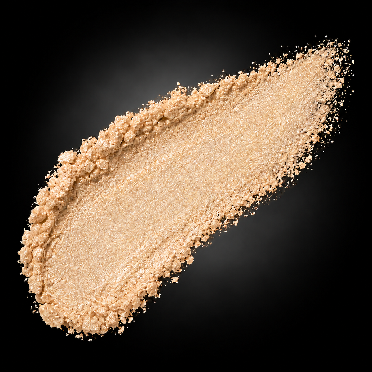 Naked Glow champagne shimmer powder swatch with soft neutral halo