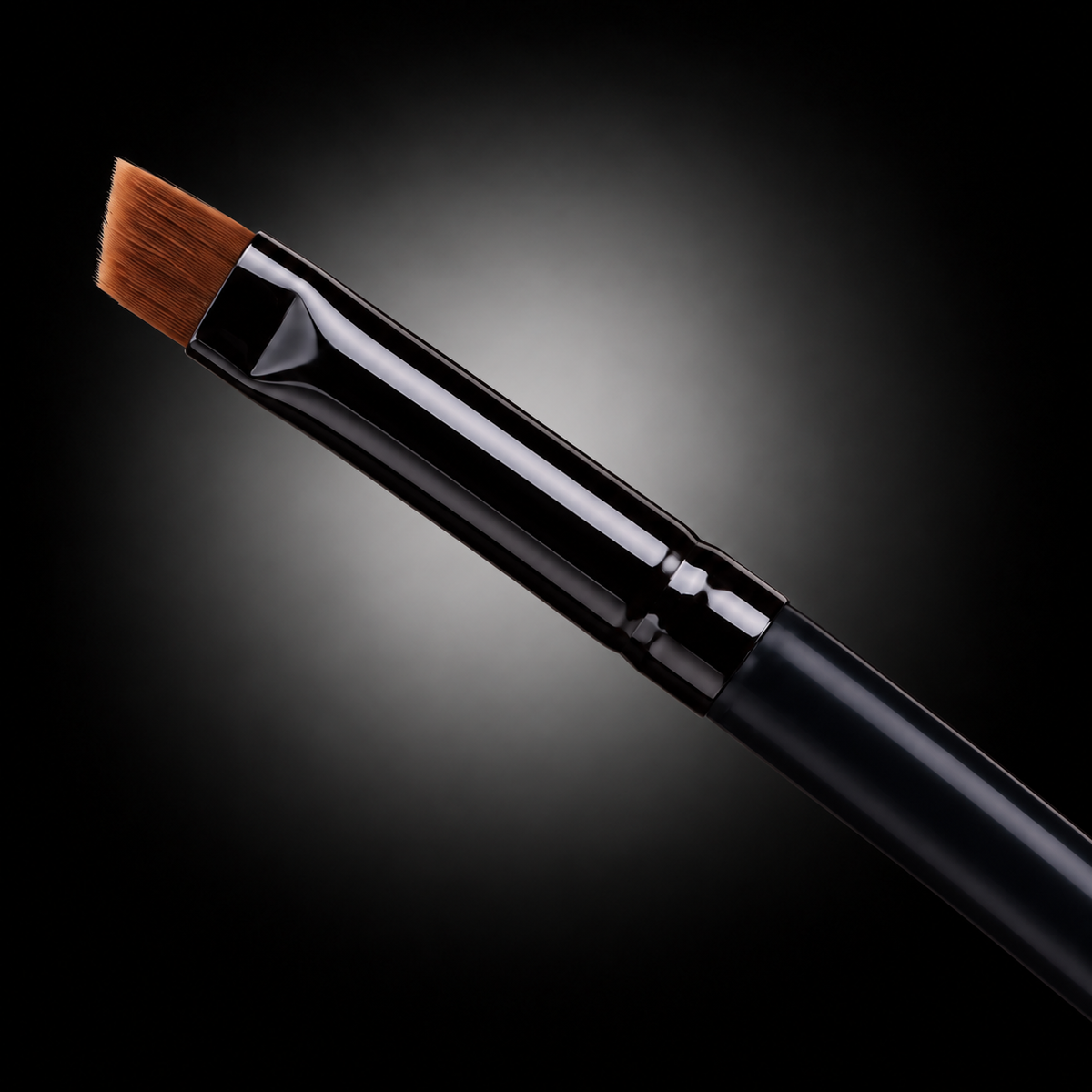 Close-up of the thin angled tip on the FACE INTERNATIONAL Dual Angle Precision Brush