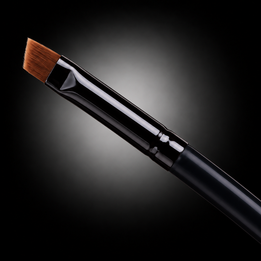 Close-up of the thin angled tip on the FACE INTERNATIONAL Dual Angle Precision Brush